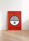 Das Bauhaus Poster zeigt dir auf rotem Hintergrund ein Auge.