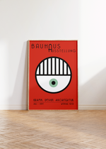 Das Bauhaus Poster zeigt dir auf rotem Hintergrund ein Auge.