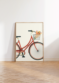 Dieses Poster im minimalistischen Stil zeigt ein rotes Damenfahrrad auf beigen Hintergrund.