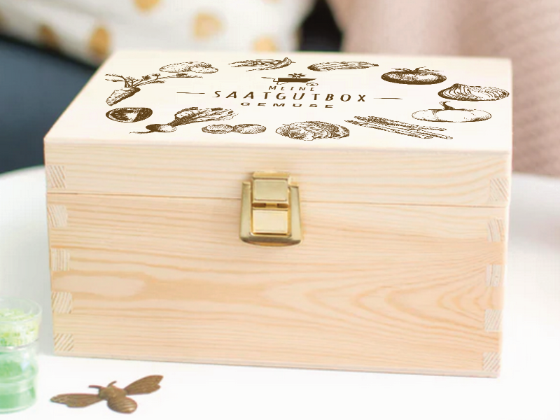 Gravierte Saatgutbox aus Holz mit Gemüse-Illustrationen – ideal zur Aufbewahrung von Samen, Gartenaccessoires oder als Geschenk für Gartenfreunde.