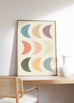 Dieses tolle Poster im Boho, Mid-Century Stil Halbmonde in verschieden Pastellfarben. Dieses minimalistische Bild eignet sich als Wanddeko in jedem Raum.